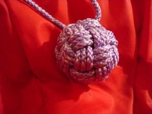 Variation on ABOK #2217 with 3 bights. In 5/32\" poly cord on 1.25\" wood ball